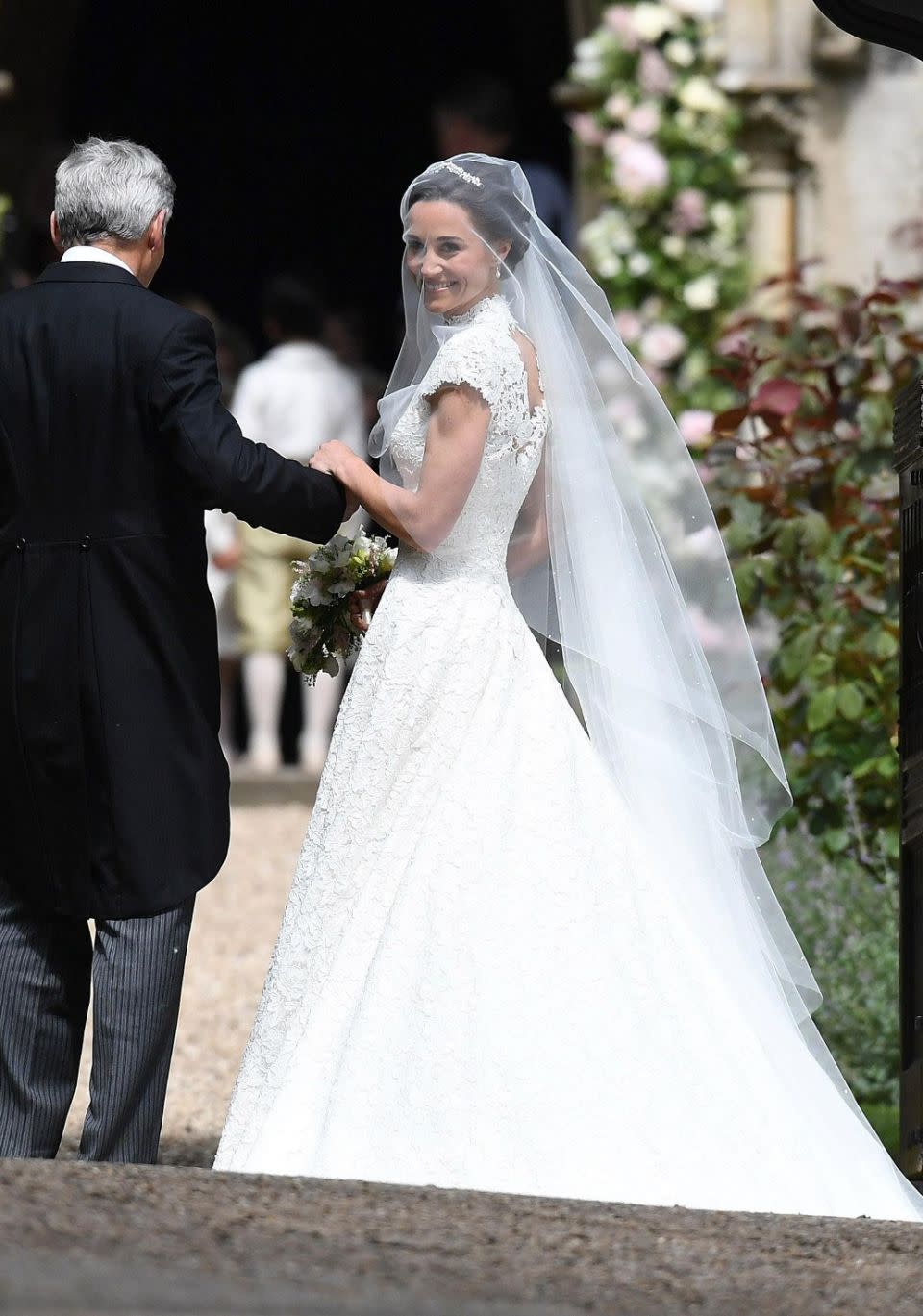 The younger sister of Duchess Kate arrived at St Mark's Church in Englefield Green, in a beautiful floor-length white gown and matching veil. Source: Getty