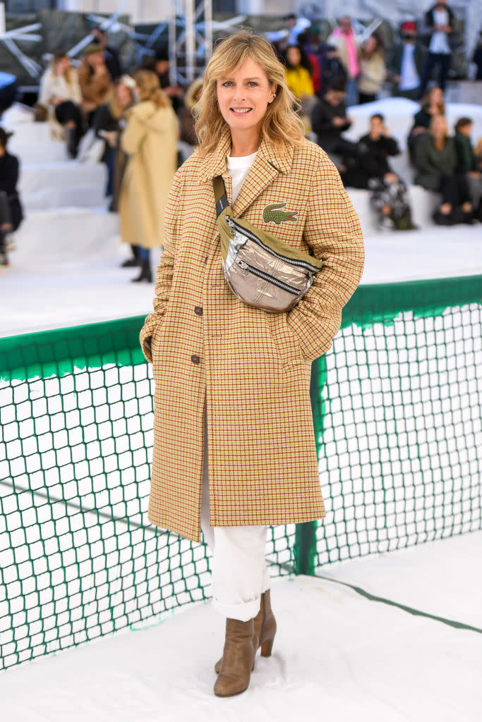 <p>Pas de doute avec un tel crocodile XXXL brodé sur son manteau, l’actrice actuellement à l’affiche de <em>L’Origine du monde</em> de Laurent Laffite ne pouvait être qu’au défilé Lacoste ! ©Getty Images</p> 