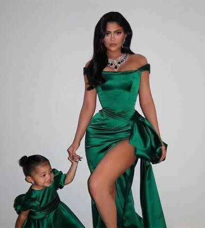 Kylie Jenner and Stormi in matching green dresses on Christmas Eve