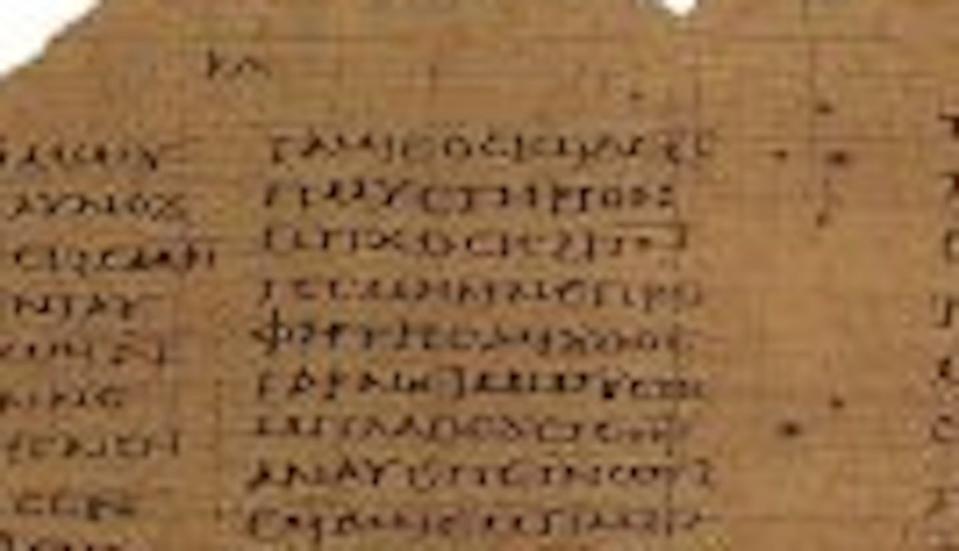 An old manuscript frayed at the edges, with text in black letters.