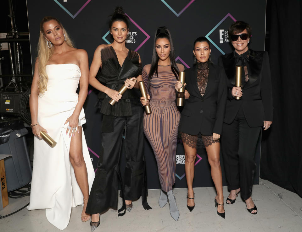 SANTA MONICA, CA - NOVEMBER 11:  2018 E! PEOPLE'S CHOICE AWARDS -- Pictured: (l-r) Khloe Kardashian, Kendall Jenner, Kim Kardashian, Kourtney Kardashian and Kris Jenner backstage during the 2018 E! People's Choice Awards held at the Barker Hangar on November 11, 2018 --  NUP_185073  --  (Photo by Todd Williamson/E! Entertainment/NBCU Photo Bank/NBCUniversal via Getty Images)