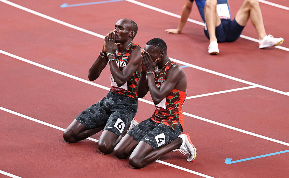 <p>Kenya's Emmanuel Kipkurui Korir celebrates winning gold alongside silver medal winner Ferguson Cheruiyot Rotich after the Men's 800m Final at Olympic Stadium on August 4.</p>