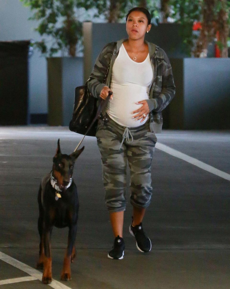 The star's wife was spotted, rocking her wedding ring, as she took the family dog to the vet in L.A. on Sunday.