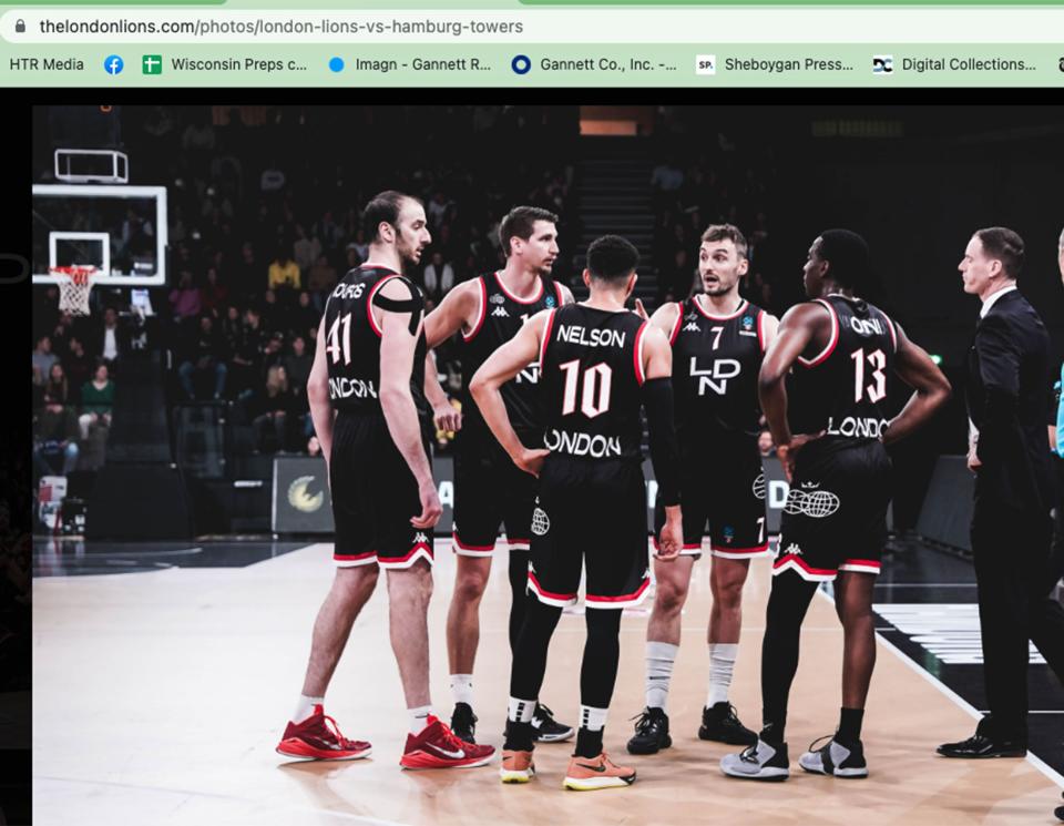 Sheboygan’s Sam Dekker (7) talks things over with his London Lions team mates during a game with the Hamburg Towers in this screen shot from the London Lions website.