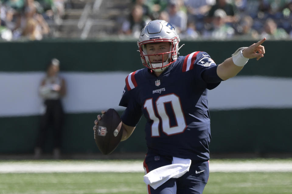 New England Patriots quarterback Mac Jones looks to throw during the first half of an NFL football game against the New York Jets, Sunday, Sept. 19, 2021, in East Rutherford, N.J. (AP Photo/Bill Kostroun)