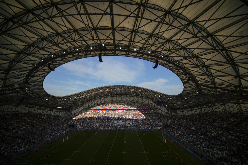 Spectator fill the stands before the Rugby World Cup quarterfinal match between Wales and Argentina at the Stade de Marseille in Marseille, France, Saturday, Oct. 14, 2023. (AP Photo/Daniel Cole)
