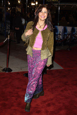 Maria Conchita Alonso wearing purple pants at the Westwood premiere of K-Pax