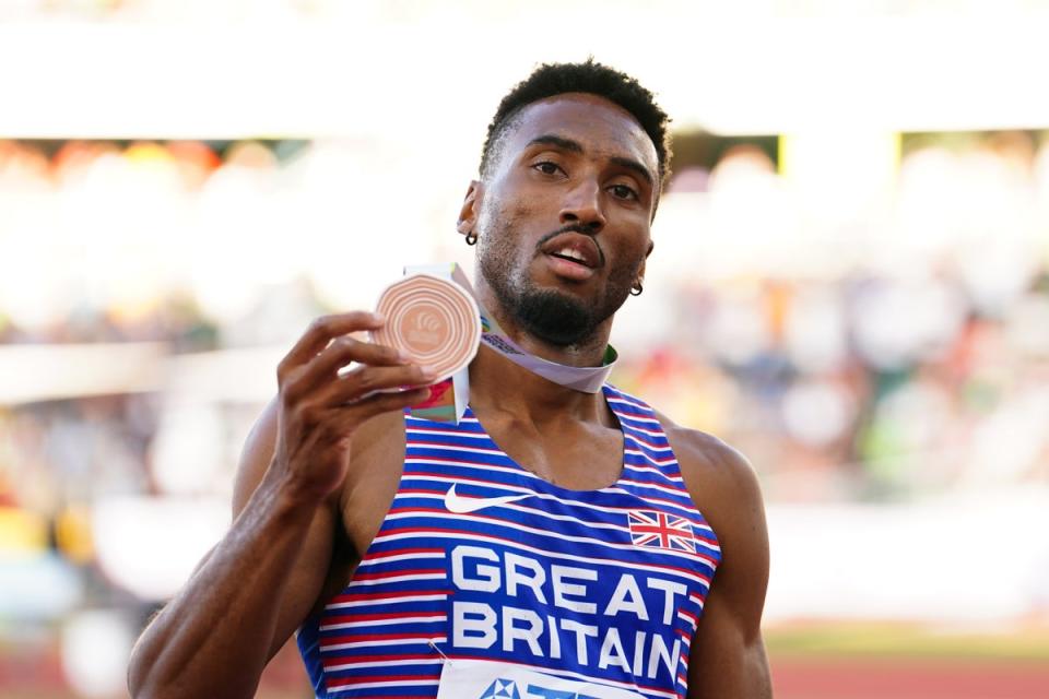 Hudson-Smith celebrates with his bronze medal at Hayward Field (Martin Rickett/PA) (PA Wire)