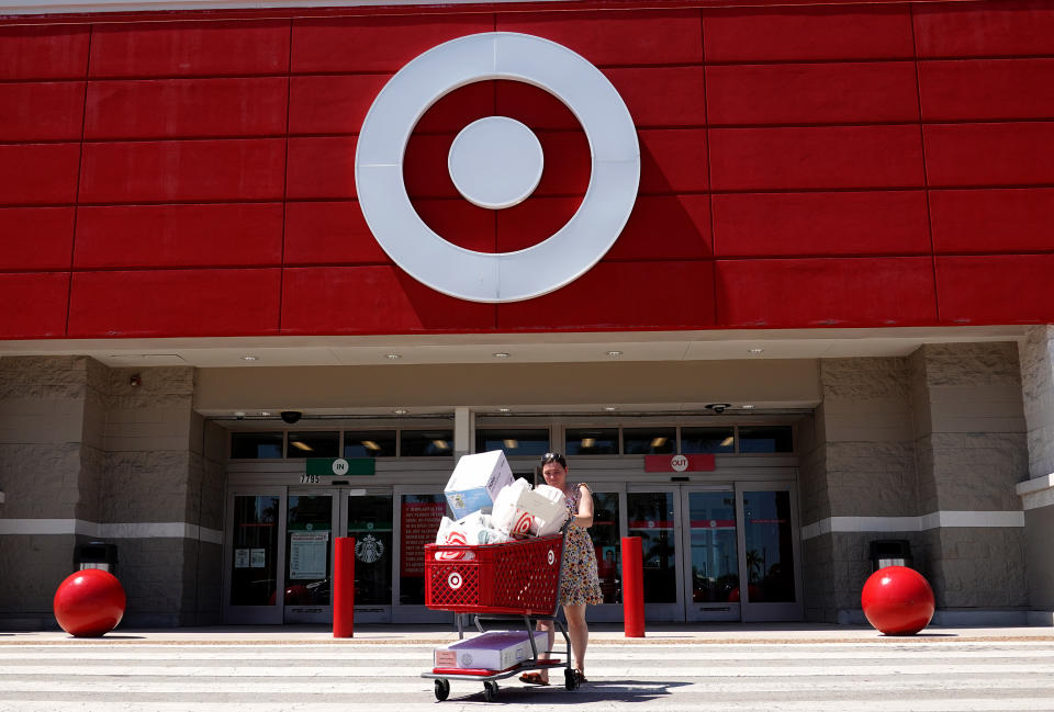 MIAMI, FLORIDA - MAY 18: A customer exits from a Target store on May 18, 2022 in Miami, Florida.  The retail store reported a 52% drop in profit for the first quarter, missing Wall Street's forecasts. The company blamed higher expenses due to continued supply chain disruptions as well as the high inflation rate. (Photo by Joe Raedle/Getty Images)
