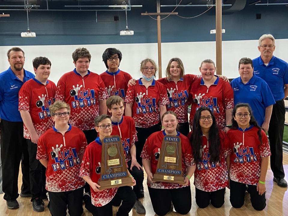 Both American Christian Academy boys and girls bowling teams pose with their 1A-5A state championship trophies after the teams swept the tournament Friday, Jan. 28, 2022 in Gadsden, Alabama.