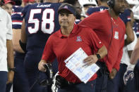 Arizona coach Jedd Fisch runs to call for a timeout during the second half of the team's NCAA college football game against Colorado, Saturday, Oct. 1, 2022, in Tucson, Ariz. (AP Photo/Rick Scuteri)