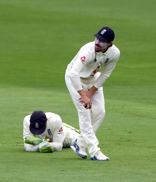 Rory Burns reacts after dropping Abid Ali in the slips