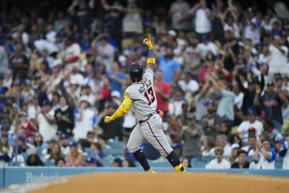 Atlanta Braves' Ronald Acuña Jr. celebrates his home run against the Los Angeles Dodgers during the third inning of a baseball game Saturday, Sept. 2, 2023, in Los Angeles. (AP Photo/Jae C. Hong)