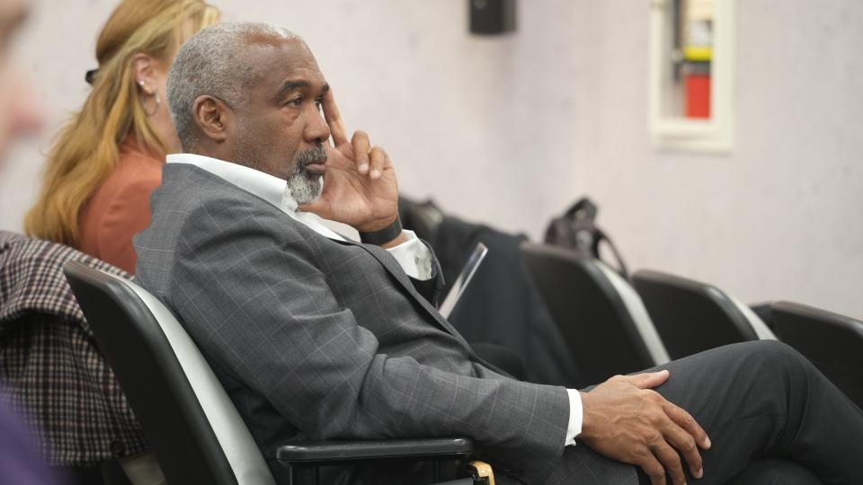 Dec 13, 2022; Columbus, Ohio, United States;  Ohio State University Athletic Director Gene Smith listens to coach Ryan Day during a news conference at the Woody Hayes Athletic Center. Mandatory Credit: Doral Chenoweth/The Columbus Dispatch