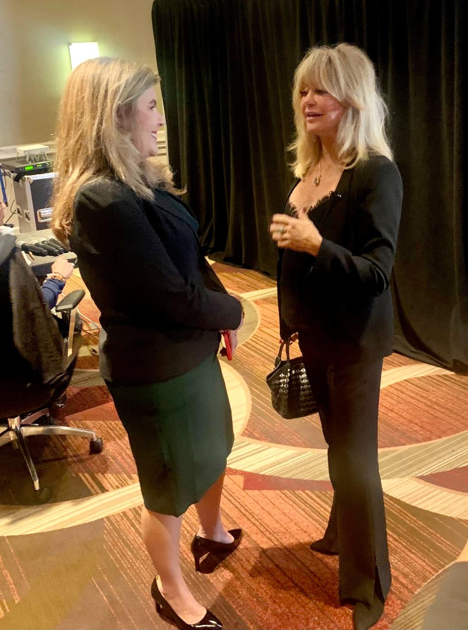 Goldie Hawn, right, actress and founder of MindUP and The Goldie Hawn Foundation, speaks backstage with Nicole Carroll, president of News and editor-in-chief of USA TODAY during the 2022 Concordia Annual Summit on Sept. 20, 2022, in New York City.