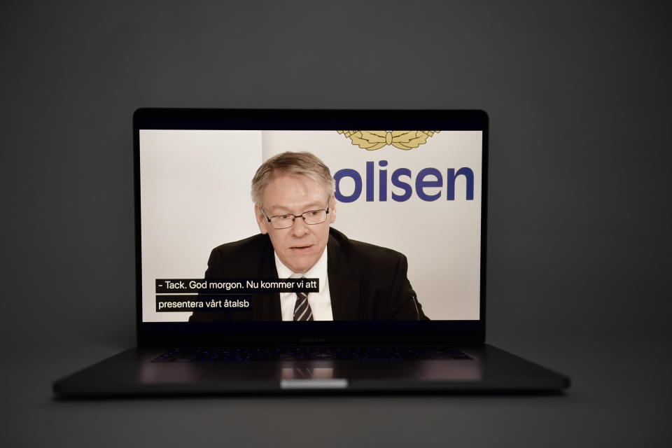 Prosecutor Krister Petersson is seen on the laptop screen as he gives a press conference on the case of Swedish Prime Minister Olof Palme who was shot dead in February 1986, in Stockholm, Sweden, Wednesday, June 10, 2020. Sweden on Wednesday dropped its investigation into the unsolved murder of former Swedish Prime Minister Olof Palme, who was shot dead 34 years ago in downtown Stockholm because the main suspect, Stig Engstrom, had died in 2000. Writing on screen reads in Swedish "Thanks. Good morning, we will be presenting each of us..." (Fredrik Sandberg/TT via AP)