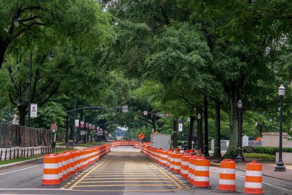 May 11 2024; Tuscaloosa, AL, USA; Campus construction projects replaces students as the dominant feature on the University of Alabama campus each summer. Barrels redirect traffic on University Boulevard to facilitate construction.