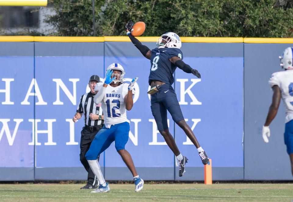 Sharod Oliver (8) breaks up the pass to Kyah Plummer (12) in the end zone during the Shorter vs UWF football game at Blue Wahoos Stadium in Pensacola on Saturday, Oct. 23, 2021.