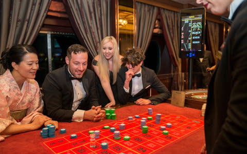 Jonathan Thompson tries his luck in the casino - Credit: PAUL WARD