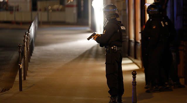 Police near the scene of the shooting in Paris. Source: AP