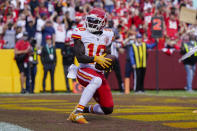 Kansas City Chiefs wide receiver Tyreek Hill (10) scores a touchdown against the Washington Football Team during the second half of an NFL football game, Sunday, Oct. 17, 2021, in Landover, Md. (AP Photo/Patrick Semansky)
