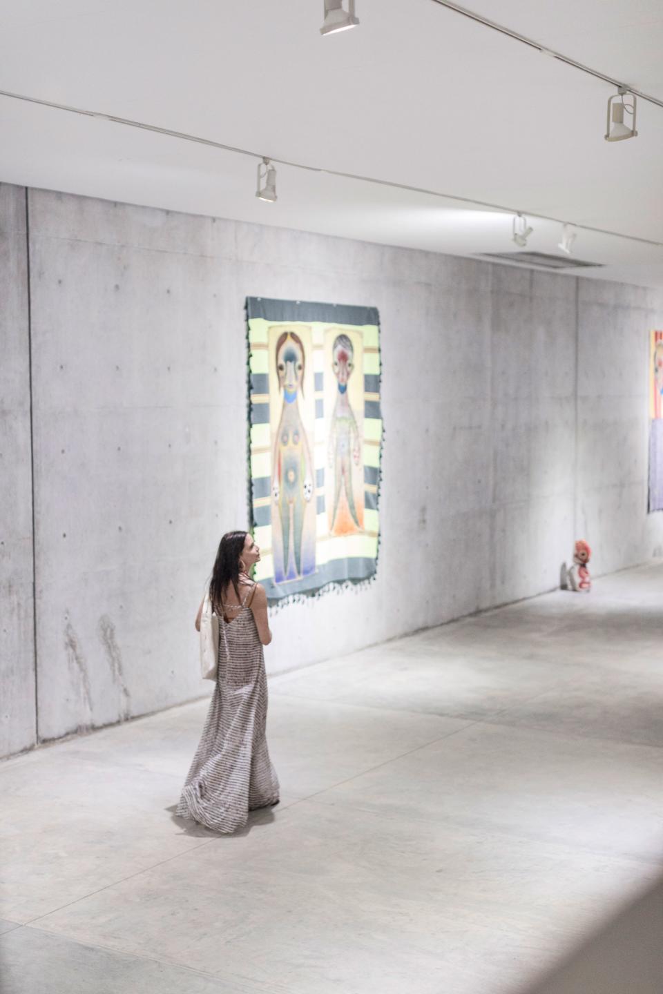 Guiding our guests through the main gallery space, where artists are chosen to showcase their work.