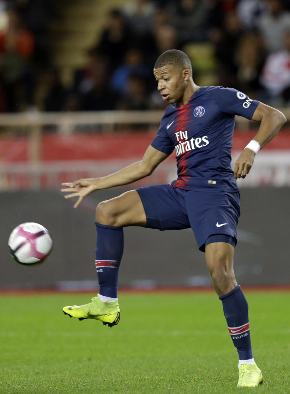 PSG's Kylian Mbappe controls the ball during the French League One soccer match between AS Monaco and Paris Saint-Germain at Stade Louis II in Monaco, Sunday, Nov. 11, 2018 (AP Photo/Claude Paris)