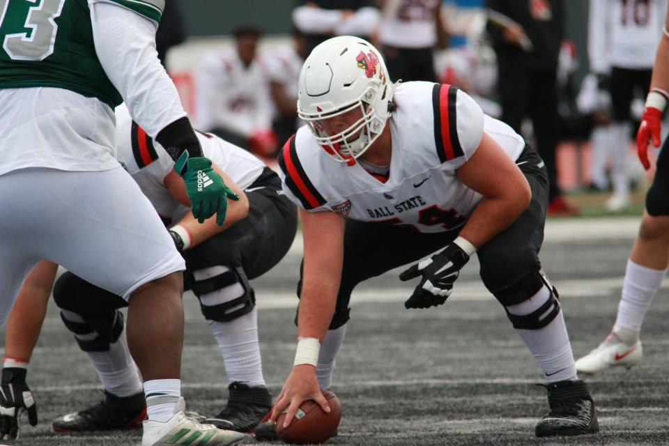 Ball State's Ethan Crowe (No. 54) prepares to snap the football during a game at Eastern Michigan Saturday, Oct. 16, 2021. Ball State won 38-31.