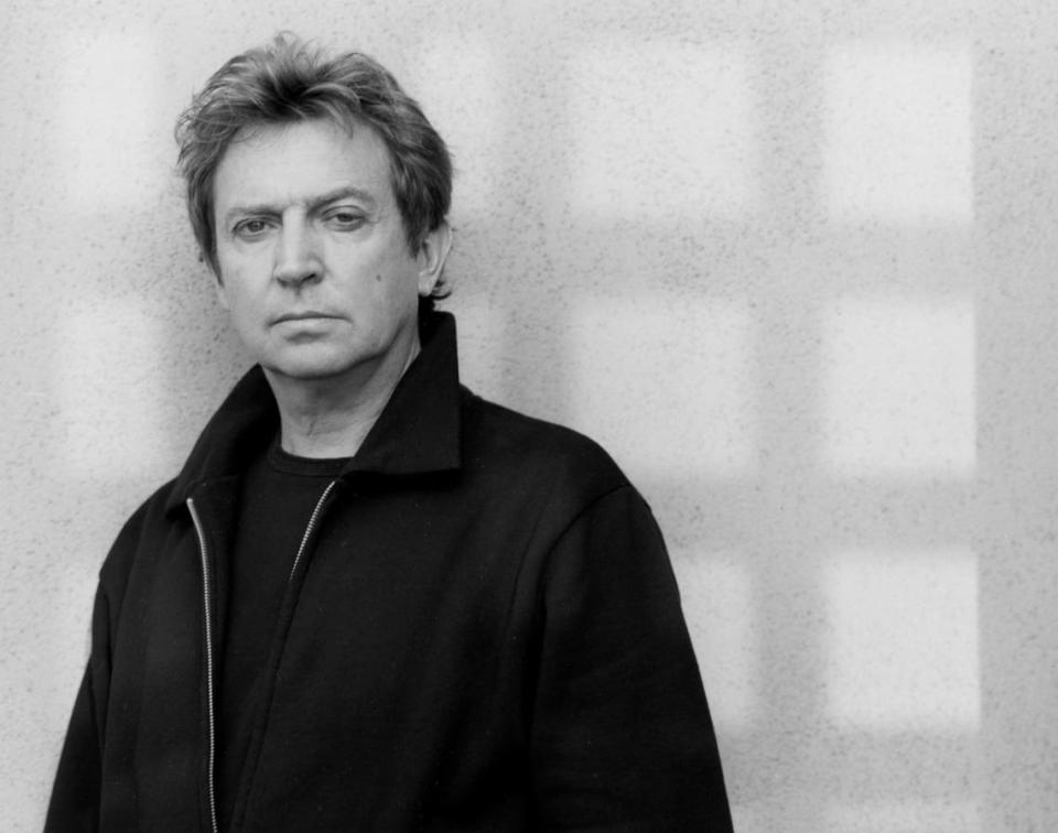 Andy Summers features his photos set to his music, including some versions of hits from The Police.