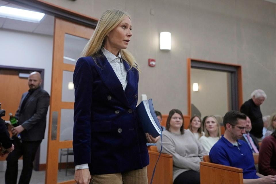 Close-up of Gwyneth standing in court