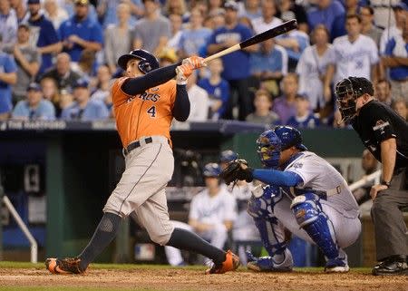 Oct 8, 2015; Kansas City, MO, USA; Houston Astros right fielder George Springer (4) hits a solo home run against the Kansas City Royals in the fifth inning in game one of the ALDS at Kauffman Stadium. John Rieger-USA TODAY Sports