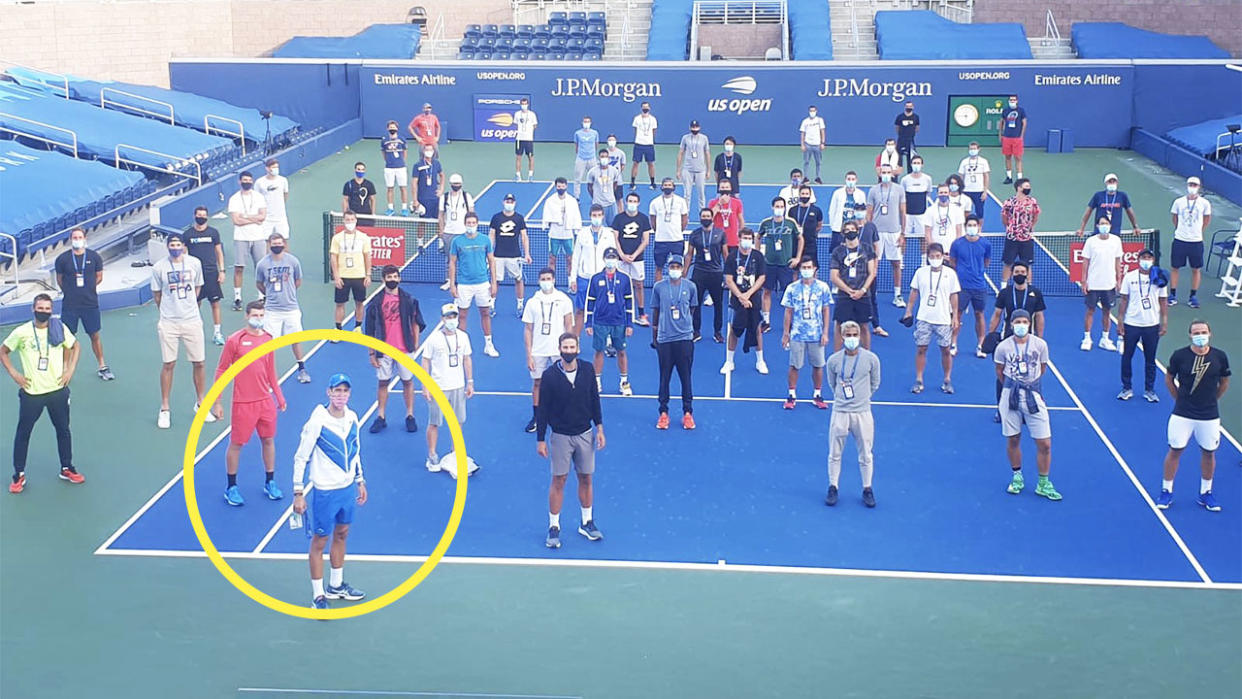 Tennis players, including Novak Djokovic at the front, pose for a photo for the new Professional Tennis Players Association.