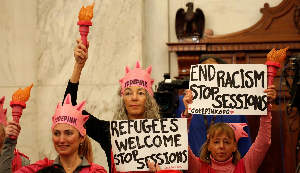 Desiree Fairooz, center, is scheduled&nbsp;be sentenced this week&nbsp;after being convicted in connection with her arrest for laughing during a Senate confirmation hearing. (Photo: Kevin Lamarque / Reuters)