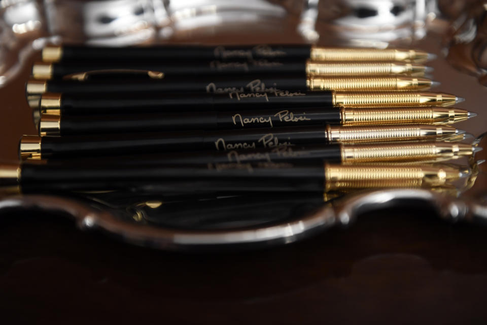 The pens that House Speaker Nancy Pelosi of Calif., will use to sign the resolution to transmit the two articles of impeachment against President Donald Trump to the Senate for trial on Capitol Hill in Washington, Wednesday, Jan. 15, 2020. . (AP Photo/Susan Walsh)