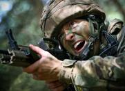 <p>A Royal Marine with a painted face (Stephen Burke/MoD) </p>