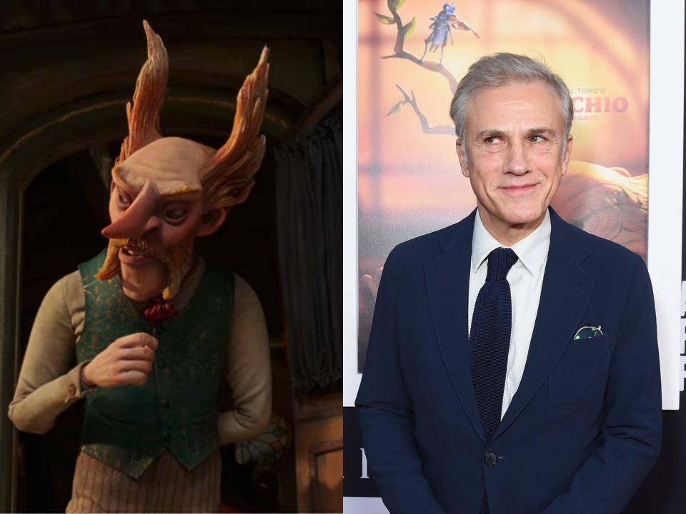 left: count volpe in pinocchio, a stop motion animated man with comical hair styled in horn-like spikes on both sides of his head and a bald patch in the middle. he has a pointy nose that sticks out straight in front of him, and a mustache that extends down past his mouth; right: christoph waltz, a middle aged man with silver hair smirking and looking to the side. he's wearing a navy suit and white shirt, and standing in front of a pinocchio poster