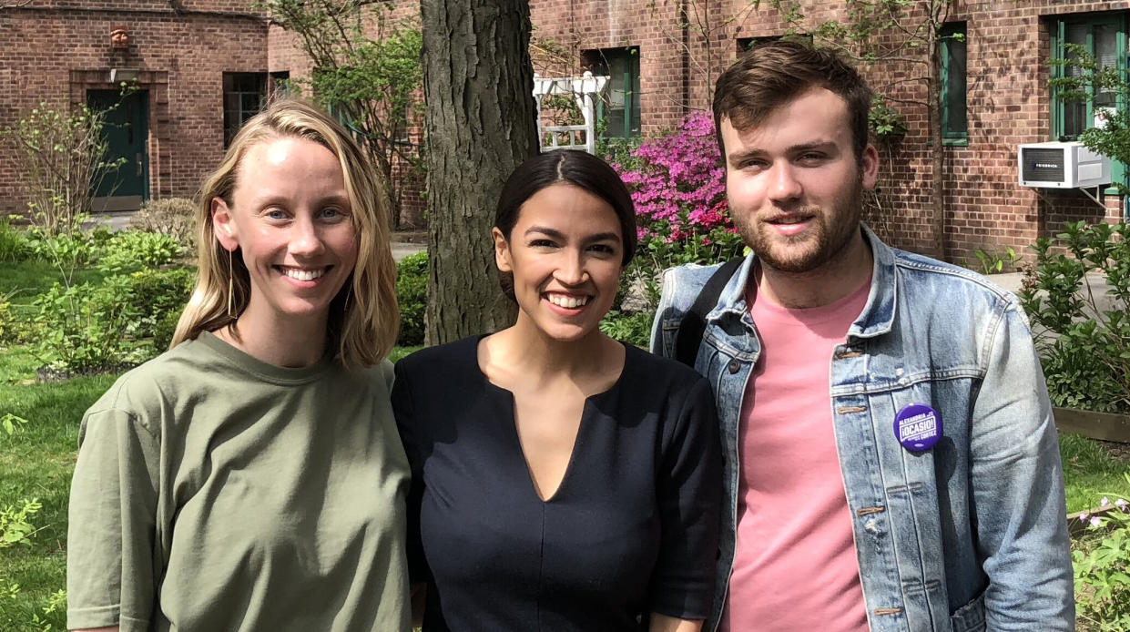 Means TV founders Naomi Burton, left, and Nick Hayes, right, with Alexandria Ocasio-Cortez. (Photo: Courtesy of MeansTV)