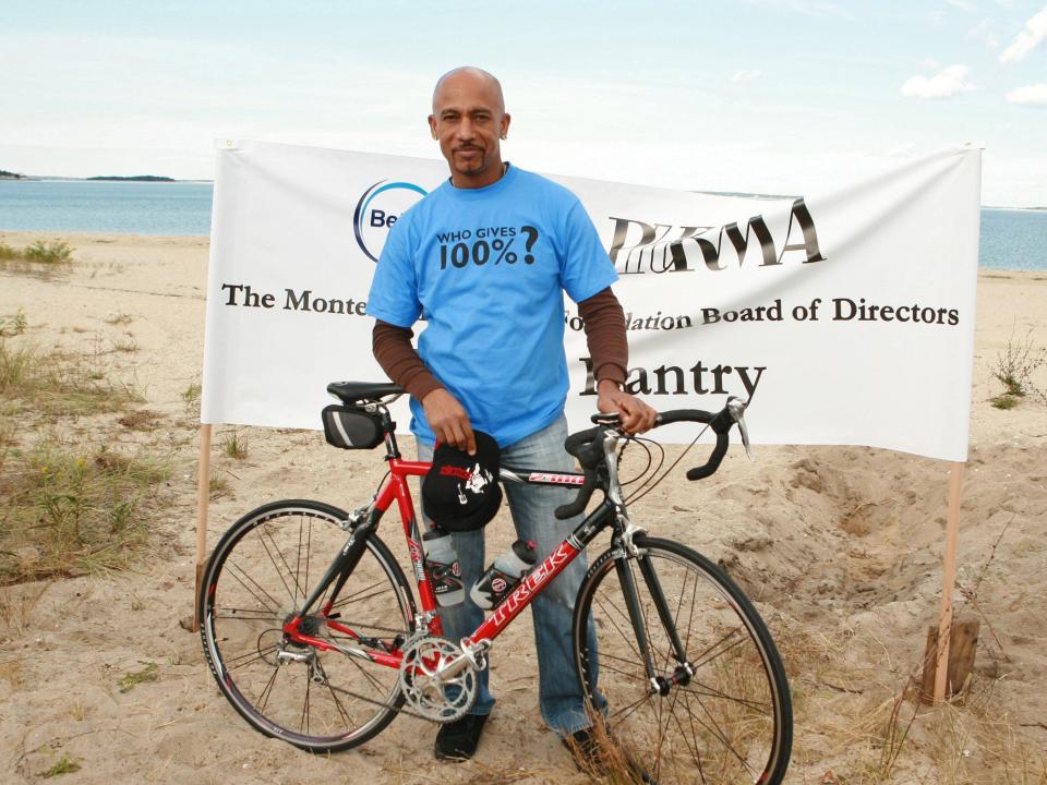 montel williams with bike on beach