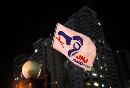 A flag with the logo of World Youth Day waves outside a church in Panama City, ahead of Pope Francis' visit for World Youth Day in Panama City, Panama January 21, 2019. REUTERS/Henry Romero