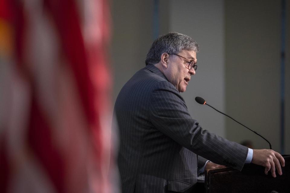 Attorney General William Barr gives the keynote address to the Center for Strategic and International Studies, CSIS China Initiative Conference, Thursday, Feb. 6, 2020, in Washington. (AP Photo/Cliff Owen)