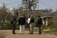 President Donald Trump tours damage from Hurricane Laura, Saturday, Aug. 29, 2020, in Lake Charles, La. (AP Photo/Alex Brandon)