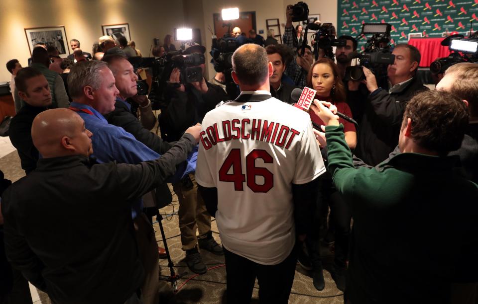 St. Louis Cardinals' newest player Paul Goldschmidt speaks with reporters after his introduction at a baseball news conference, Friday, Dec. 7, 2018, at Busch Stadium in St. Louis. The six-time All-Star was acquired from Arizona this week and will earn $14.5 million in the final season of a seven-year deal that will pay $46 million, including a $1 million assignment bonus for the trade. (Robert Cohen/St. Louis Post-Dispatch via AP)
