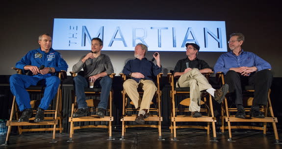 From left to right: NASA astronaut Drew Feustel, actor Matt Damon, director Ridley Scott, author Andy Weir and NASA planetary science chief Jim Green participate in a Q&A session about NASA’s journey to Mars and the film “The Martian” on Aug. 1