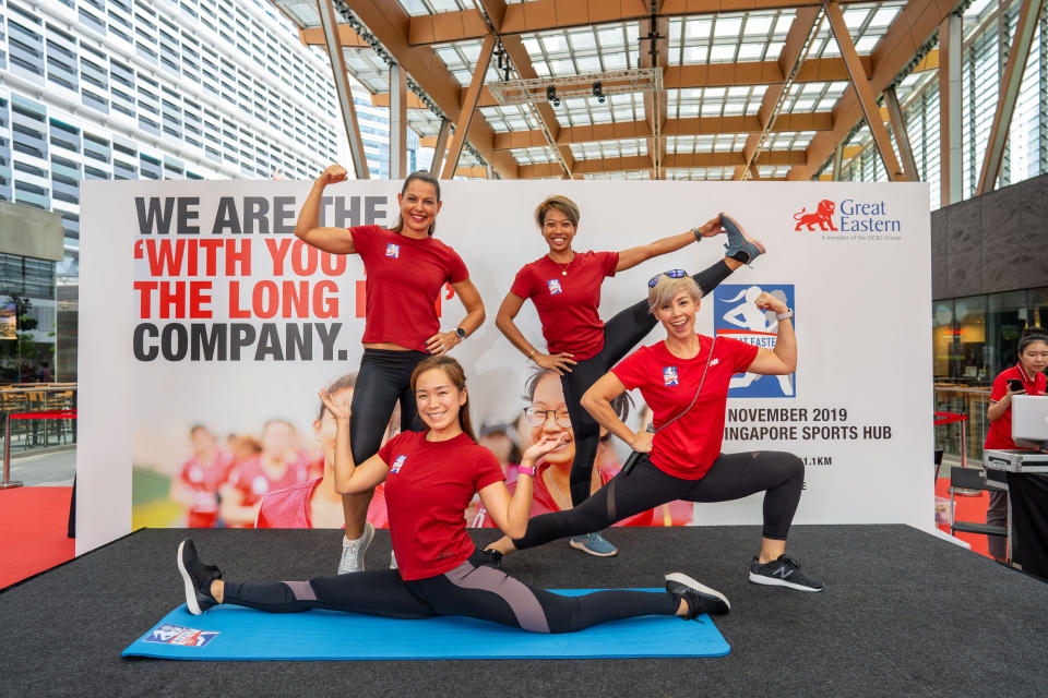 Fitness trainers (from left) Natalie Dau, Wany Misban and Roxanne Gan, as well as emcee Kelly Latimer at the launch of the Great Eastern Women's Run 2019. (PHOTO: Great Eastern Women's Run)