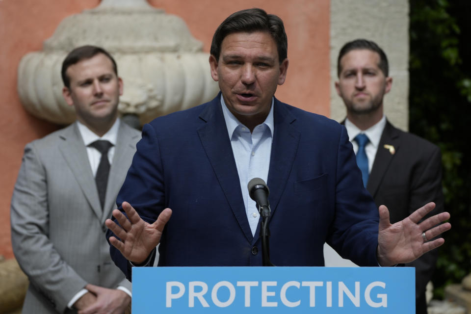 Florida Gov. Ron DeSantis speaks during a news conference at Vizcaya Museum and Gardens, Tuesday, Feb. 1, 2022, in Miami. (AP Photo/Rebecca Blackwell)