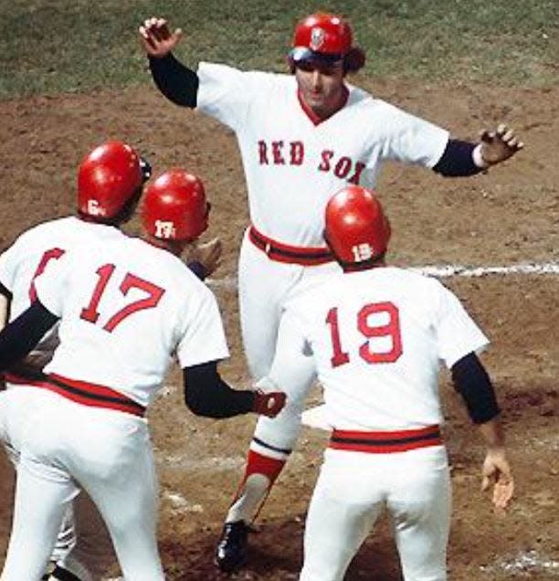 Here's Bernie Carbo, crossing home plate after tying Game 6 of the 1975 World Series with a three-run homer.