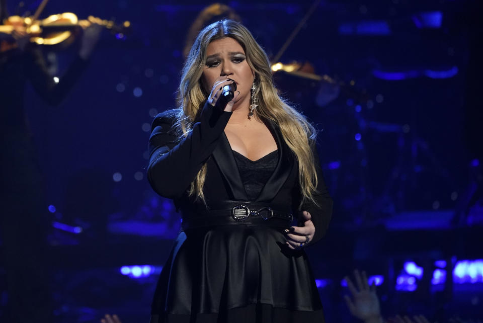 FILE - Kelly Clarkson performs during a tribute to Icon award winner Pink at the iHeartRadio Music Awards on Monday, March 27, 2023, at the Dolby Theatre in Los Angeles. Clarkson will perform at the iHeartRadio Music Festival in Las Vegas. (AP Photo/Chris Pizzello, File)