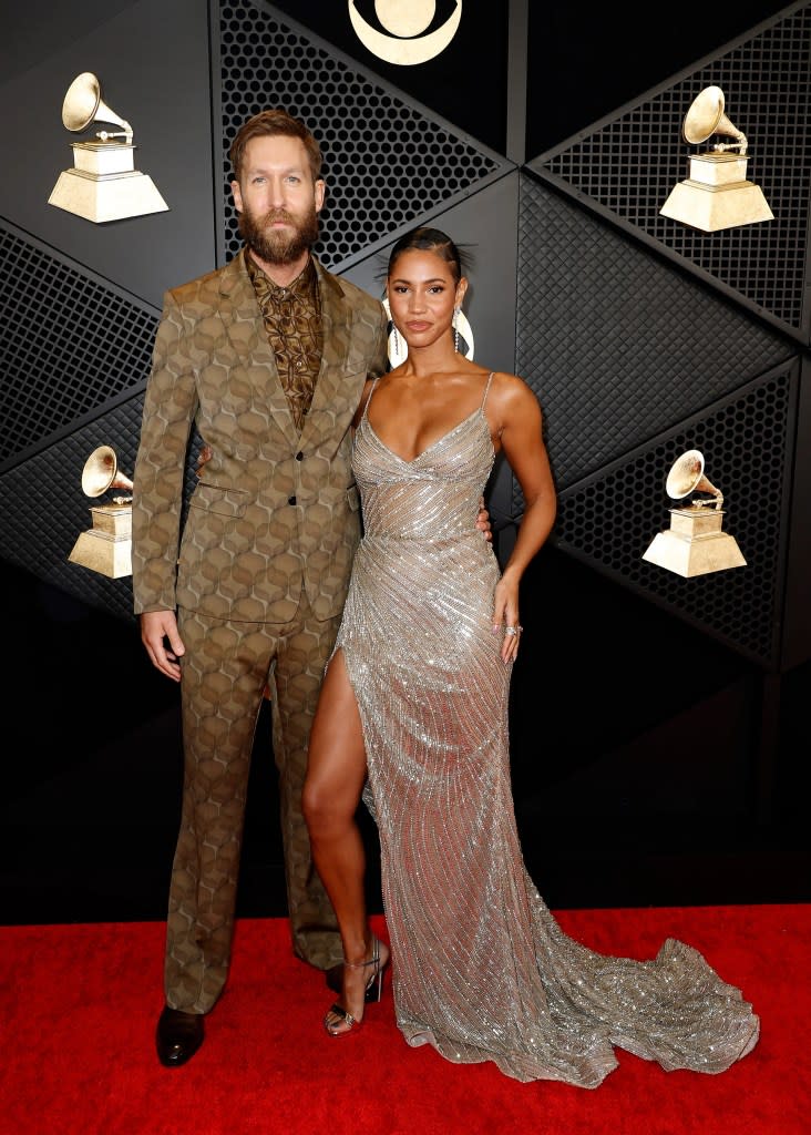 (L-R) Calvin Harris and Vick Hope attend the 66th GRAMMY Awards at Crypto.com Arena on February 04, 2024 in Los Angeles, California.