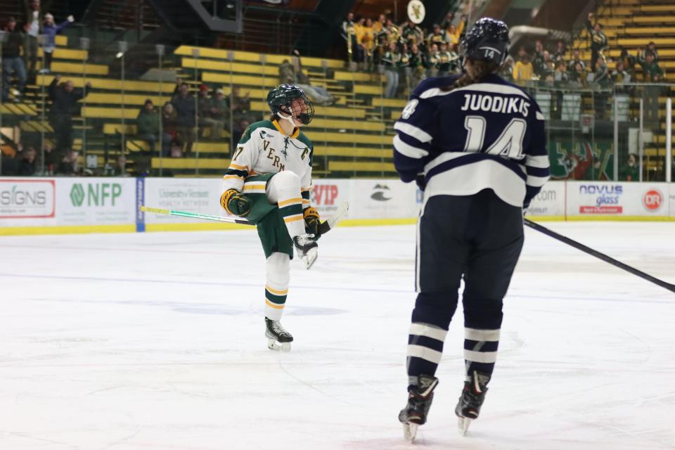 Theresa Schafzahl celebrates her game-winning goal in overtime of Vermont's 2-1 win over New Hampshire in the Hockey East quarterfinals at Gutterson Fieldhouse on Saturday, Feb. 23, 2023.