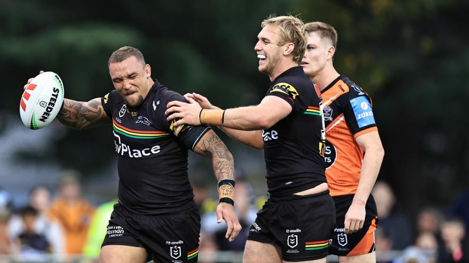 James Fisher-Harris celebrates his late try for Penrith.